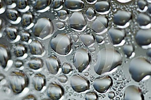 Water drops macro from a plastic bottle fifty megapixels photo