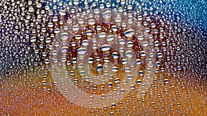 Water drops. Many drops abstract background. Colored drop texture. Rainbow gradient. Heavily textured image. Shallow depth of