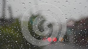 Water drops of rain on car windshield