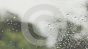 Water drops of rain on car windshield