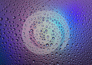 Water drops with reflection of the rainbow