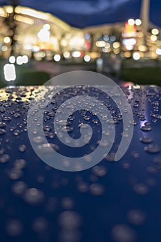 Water drops on a shiny surface, selective focus. Rain drops.