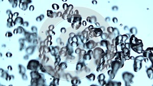 Water drops spurting out against White Background