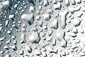 Water drops on stainless steel background