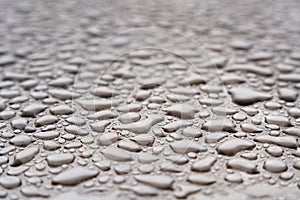 Water drops on stainless steel after rain