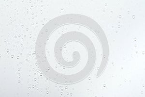 Water drops on white surface background