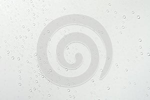 Water drops on white surface background