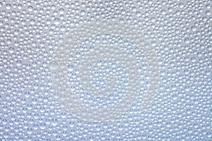 Water drops on white surface background