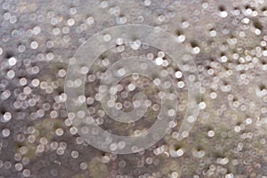 Water drops on the window, blurred. Droplets background. Water on metal surface. Grey glitter, defocused.
