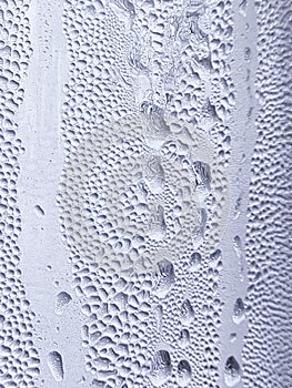 water drrops on a bottle background frozen cold