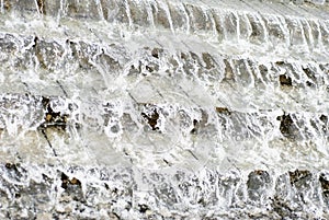 Water encroaching on the stairs.