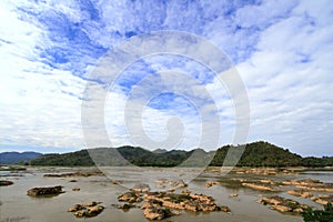 Water eroded rocks and islets in mekong river