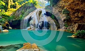 Water fall located in deep rain forest jungle