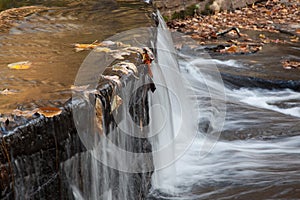 Water falling over a dam