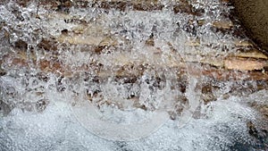 Water Falling over Graded Stone Steps