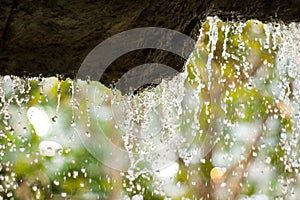 Water falling over rock ledge