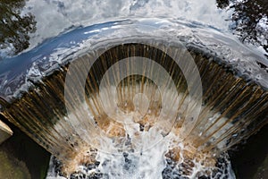 Water falling over a weir