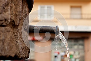 Water falling by Source pipe in the town