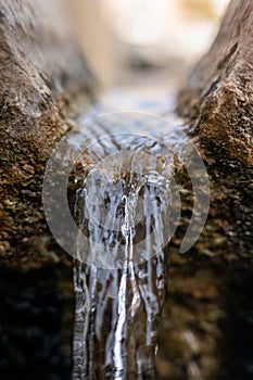 Water falling to the bottom of the pond