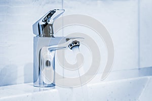 Water faucet in the bathroom or toilet