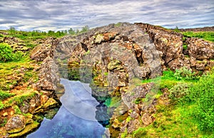 Water in a fissure between tectonic plates in the Thingvellir National Park, Iceland