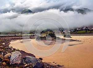 Water flood on river after heavy rain rapids water flow copiously