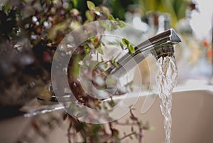 water flow form the tap in a inside garden