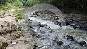 water flow over mossy rock