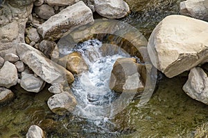 Water flow among stones