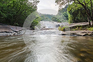 Water flowing below the waterfall
