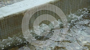 Water flowing on the curb