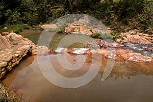 Water Flowing Down a Stream in the Savannas of Brazil photo