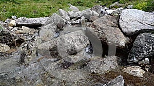 Water flowing in a mountain stream slow motion