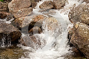 Water flowing from the mountains. A mountain stream
