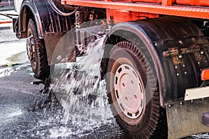 Water flowing out of a water tank of a machine