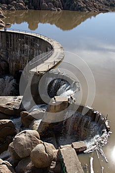 Water flowing over a dam