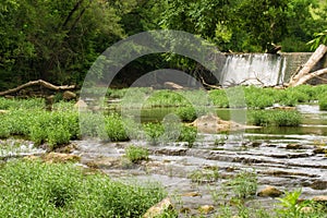 Water Flowing Over a Dam