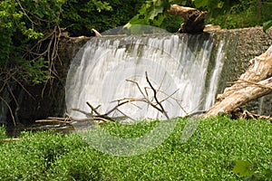 Water Flowing Over a Dam
