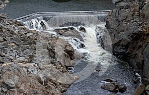 Water flowing over Dam