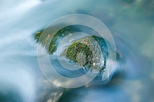 Water flowing on the stones photo