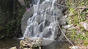 Water flows in the famous Mirveti Waterfall, which is in the forest near the city of Batumi