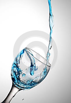 Water flows in a glass