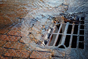 Water flows into the hatch on a spring sunny day