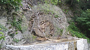 Water flows from the rock.