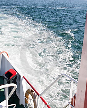 Water foam and boat photo