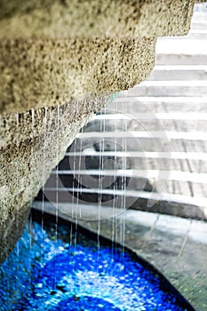Water fontain with blue mosaic photo