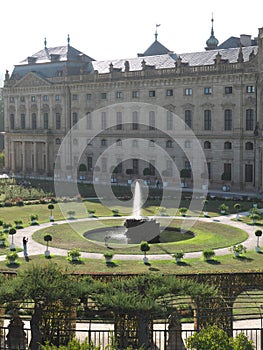 Water fountain in the courtyard garden in front of the facade in Würzburg