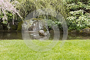 Water Fountain in Garden Pond