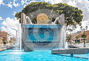 Water fountain monument with Golden Inca Sun Disc in the streets of Cusco City - Cusco, Peru