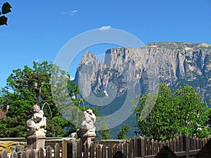 Water Fountain with mountains in the background in Bolzano, Italy